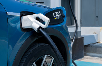 car charging at electric car charging station