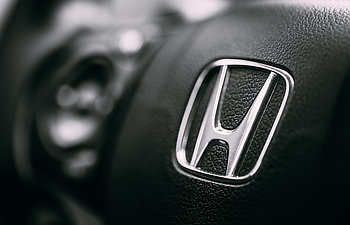 honda black steering wheel and silver logo